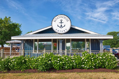 Low angle view of clock against building