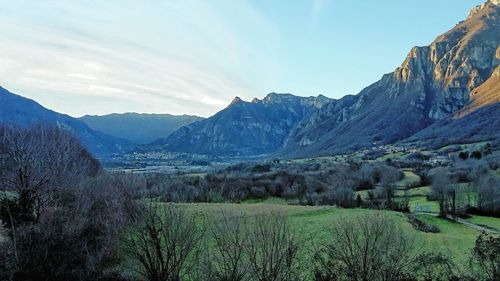 Scenic view of landscape against blue sky