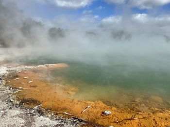 Smoke emitting from volcanic landscape