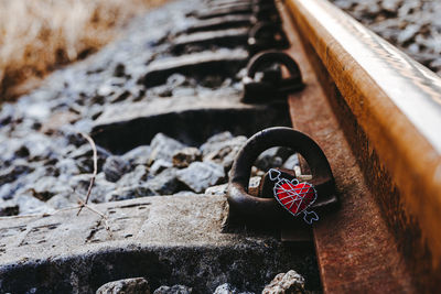 Close-up of padlocks on rock