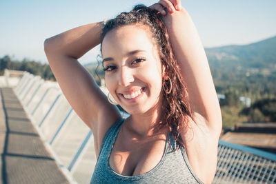 Portrait of young woman looking away