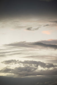 Low angle view of clouds in sky during sunset