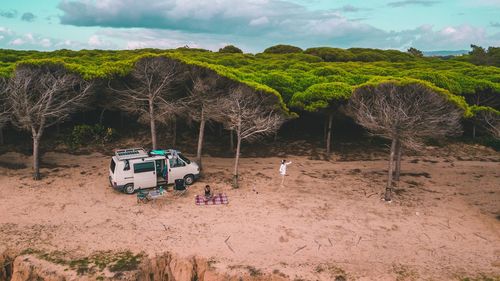 Panoramic view of empty road on field against sky