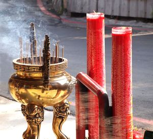 Close-up of smoke emitting from incense sticks