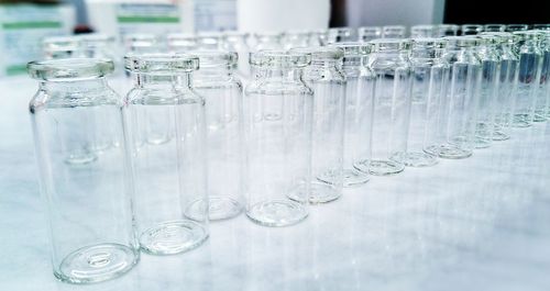 Close-up of glass bottle on table