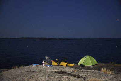 View of tourist camping at sea