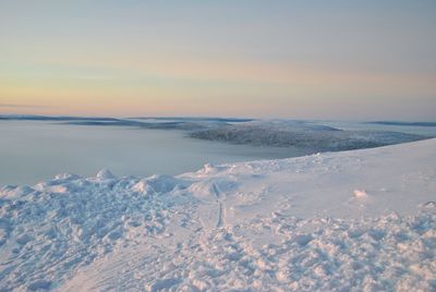 Scenic view of sea against sky during sunset