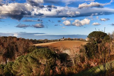 Scenic view of land against sky