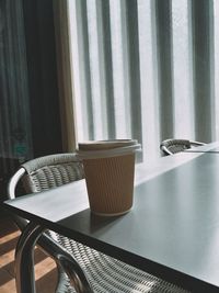 High angle view of chairs on table at home