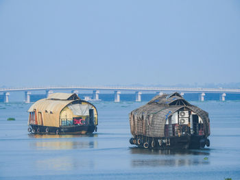 Boat in sea against clear sky