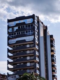 Low angle view of modern building against sky