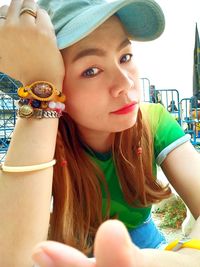 Portrait of beautiful woman sitting in traditional clothing