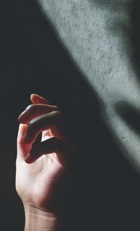 Close-up of person hand on finger