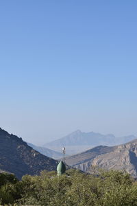 Scenic view of landscape against clear blue sky