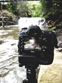 Close-up of camera on water