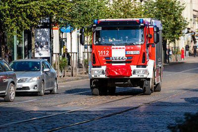 View of vehicles on road in city