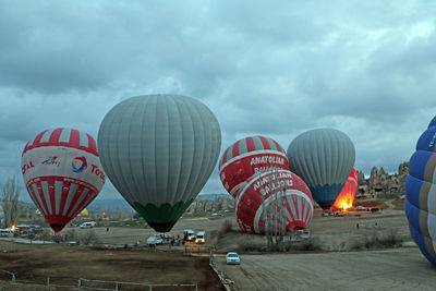 Hot air balloons against sky