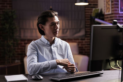 Businesswoman working at desk in office