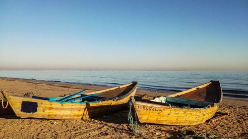 Scenic view of beach against clear sky