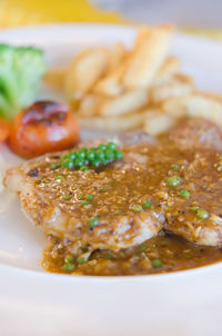 Close-up of served food in plate