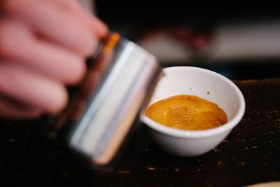 Close-up of hand holding drink