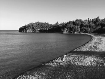 Scenic view of lake against clear sky