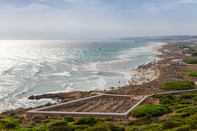 High angle view of sea against cloudy sky