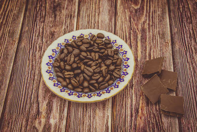 High angle view of coffee in cup on table