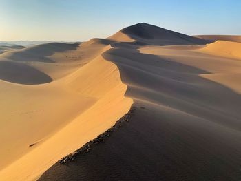 Scenic view of desert against sky