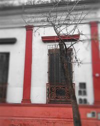 Low angle view of red door on building