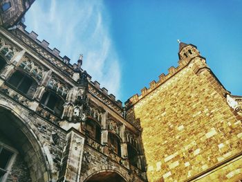 Low angle view of building against blue sky