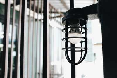 Close-up of light bulb hanging