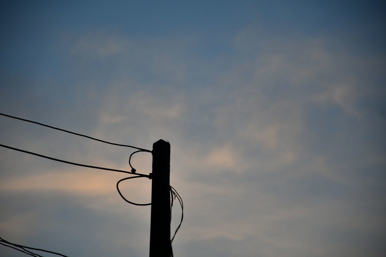 LOW ANGLE VIEW OF SILHOUETTE ELECTRICITY PYLON AGAINST SKY DURING SUNSET