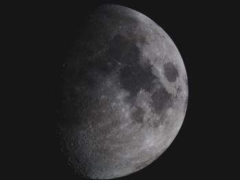 Low angle view of moon against clear sky at night