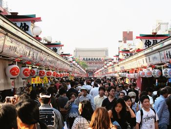 People at town square against clear sky