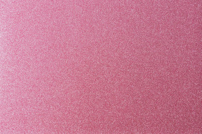 Pink shiny and glittering surface. abstract background. events, celebrations. trendy backdrop