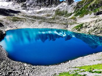 Scenic view of blue sea and mountain