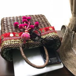 Close-up of flowers in basket on table