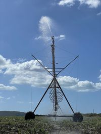 Scenic view of irrigation system in countryside. 