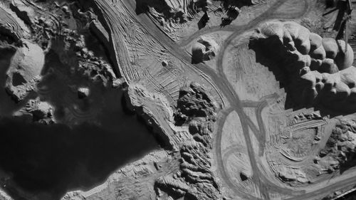 High angle view of sculptures on beach