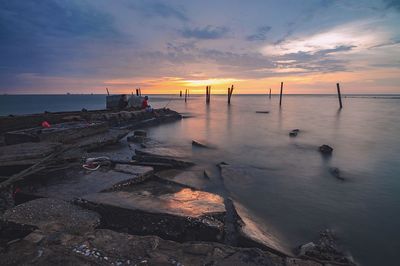 Scenic view of sea against sky during sunset