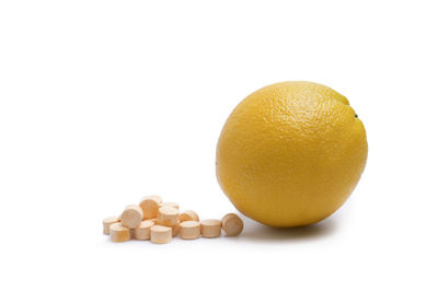 Close-up of oranges against white background