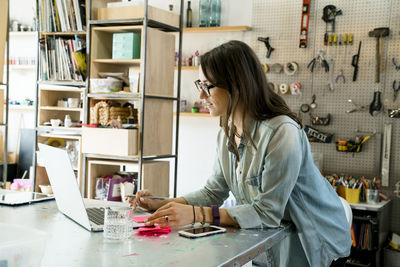 Woman working on table