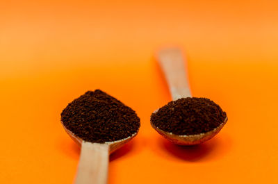 Close-up of cake against orange background