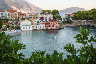 View of buildings by sea