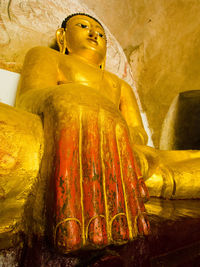 Low angle view of buddha statue in temple