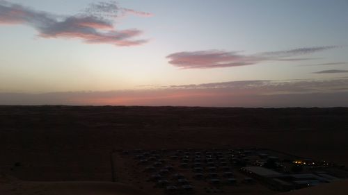 High angle view of buildings against sky during sunset