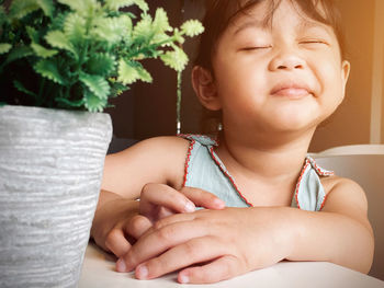 Portrait of cute baby girl at cafe