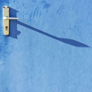 Close-up of tree against blue sky