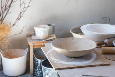 Close-up of tea cups on table